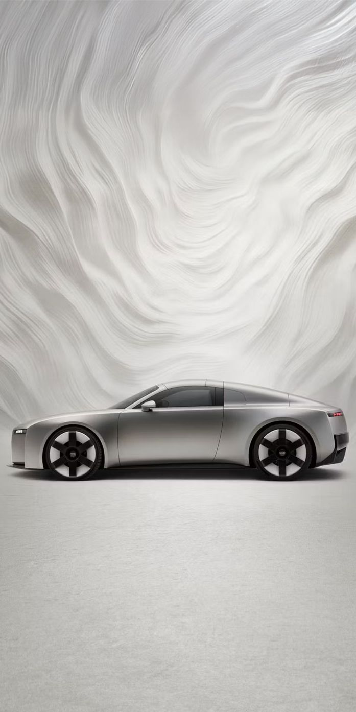 Vedere laterală a unui Audi Concept C în fața unui fundal grafic