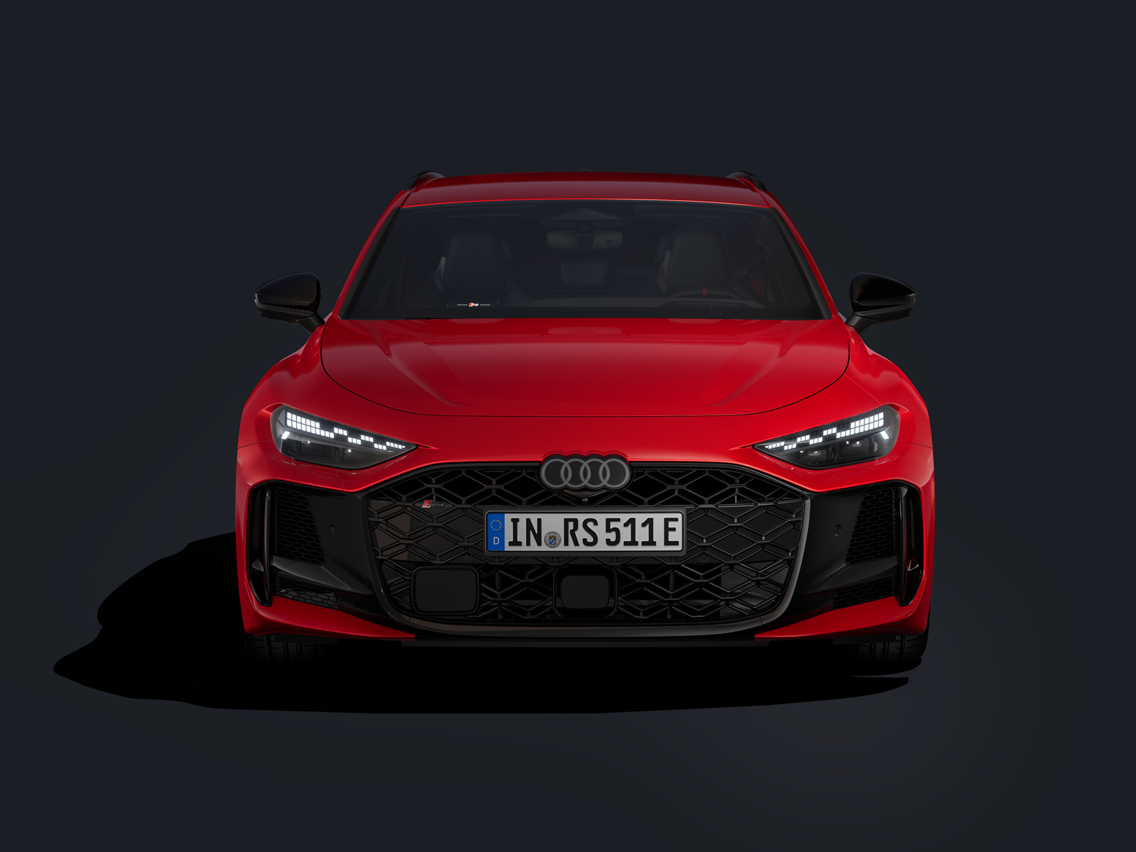 Un Audi RS 5 Avant roșu este ilustrat frontal pe un fundal negru.