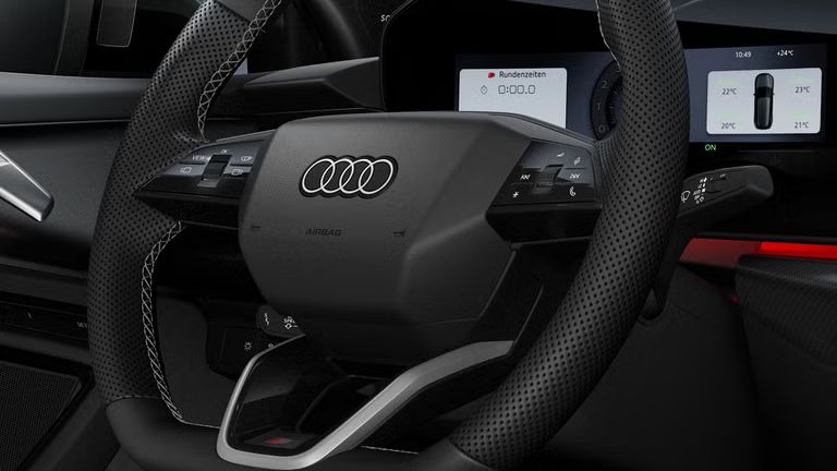 Innenaufnahme der Audi S3 Limousine mit Fokus auf das Lenkrad.