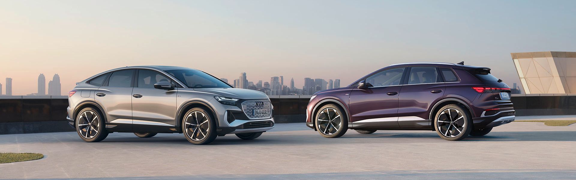 Hero Range beauty Q4 Sportback e-tron 3/4 front + Q4 e-tron profile