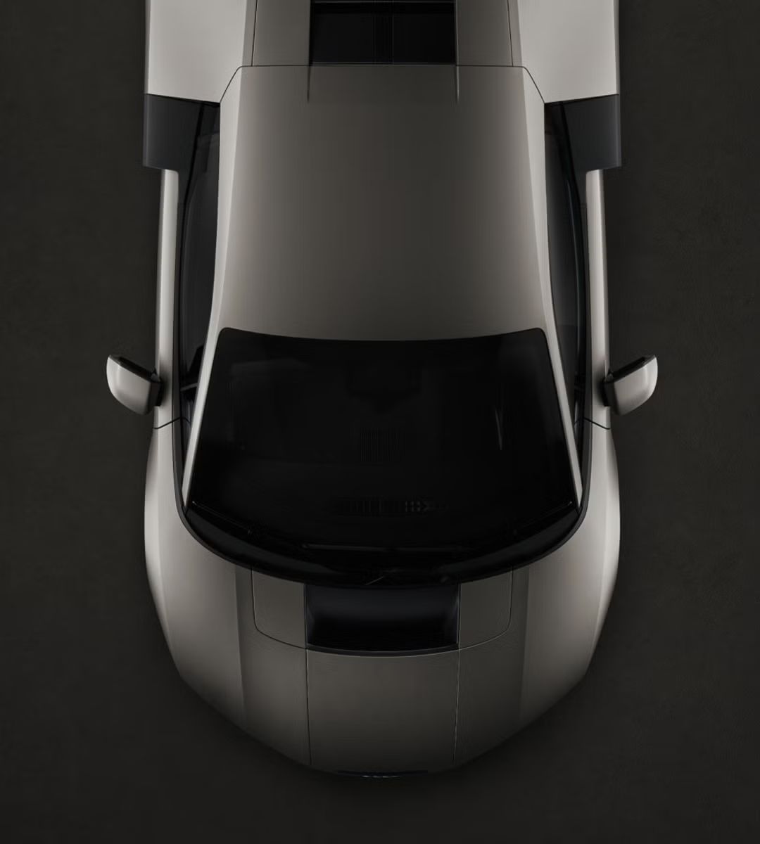 Draufsicht auf den Audi Nuvolari, die seine markante Karosserieform und die Proportionen des Mittelmotors hervorhebt.